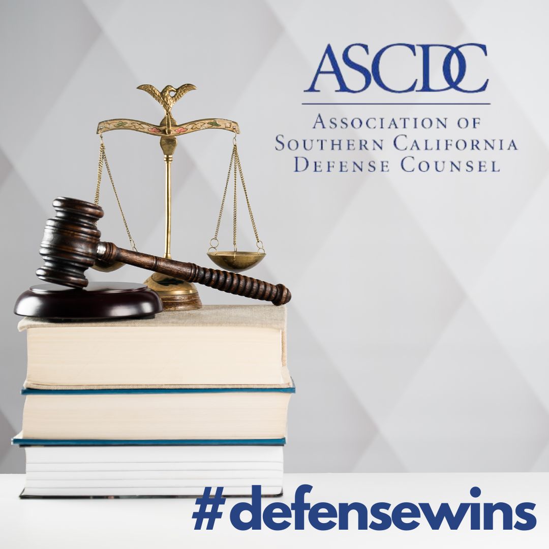 ASCDC #defensewins with photo of books, scales and gavel